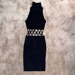 Black knit dress with open cris cross center